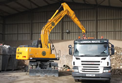 Skip Hire Ongar unloading a lorry